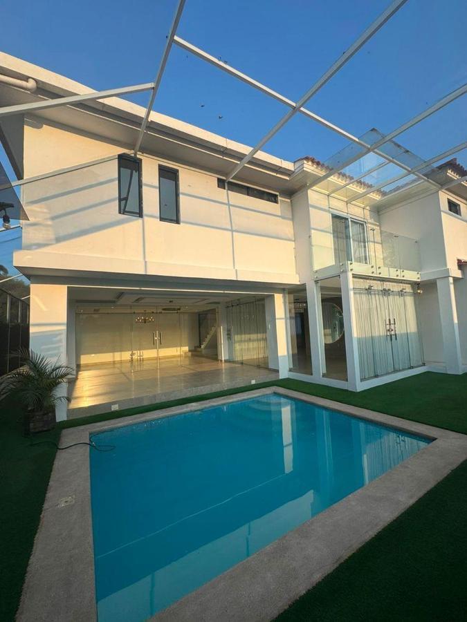 Casa de Lujo con Piscina y 4 Parqueos en Urbanización Privada - Estancias del Río, Guayas — imagen 8